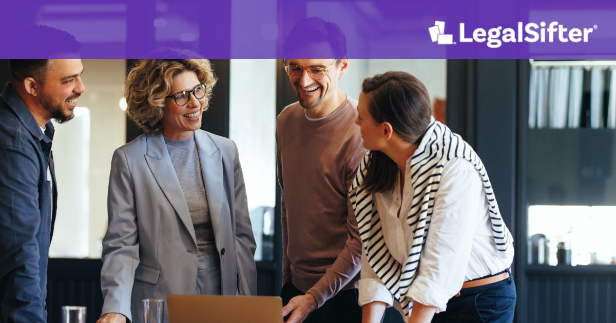 Four business professionals standing together in an office, smiling and collaborating around a laptop. A purple banner with the LegalSifter logo appears across the top.